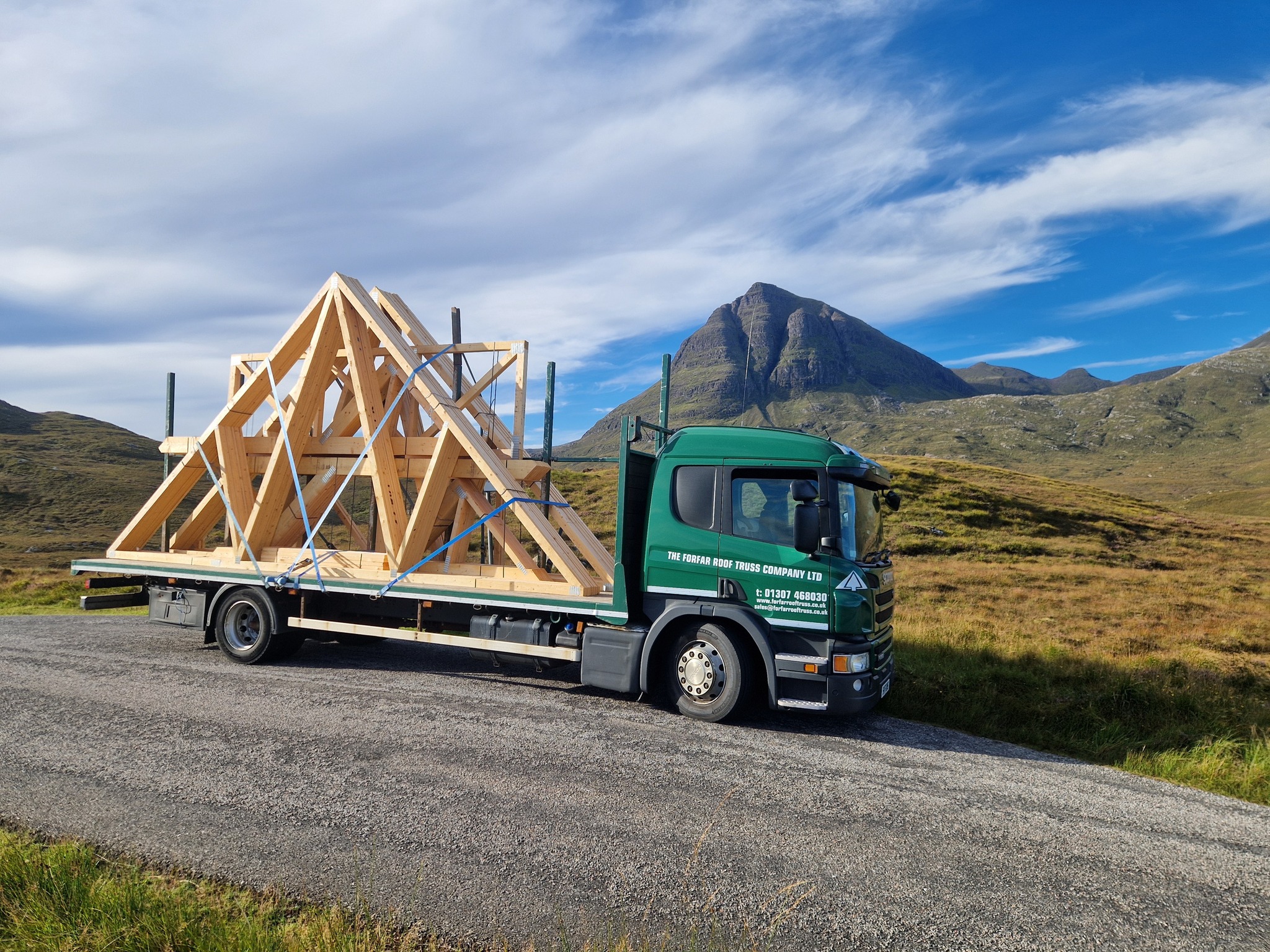 Timber roof trusses stacked on lorry in Scotland